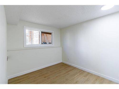 1-1709 48 Street Se, Calgary, AB - Indoor Photo Showing Other Room