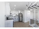 1-1709 48 Street Se, Calgary, AB  - Indoor Photo Showing Kitchen With Upgraded Kitchen 