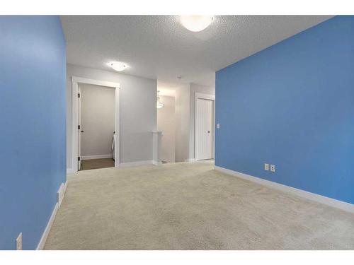 10 Nolanfield Road Nw, Calgary, AB - Indoor Photo Showing Other Room