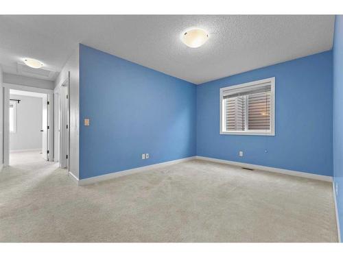 10 Nolanfield Road Nw, Calgary, AB - Indoor Photo Showing Other Room