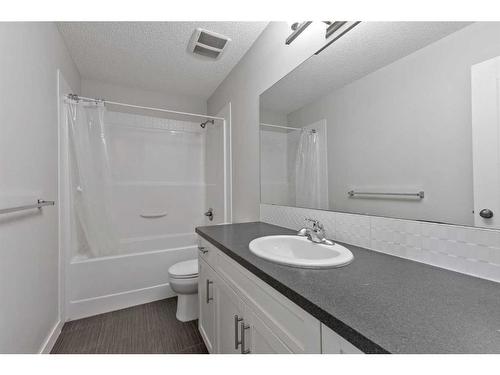 10 Nolanfield Road Nw, Calgary, AB - Indoor Photo Showing Bathroom