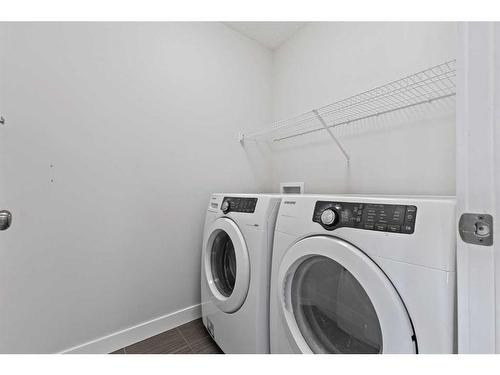 10 Nolanfield Road Nw, Calgary, AB - Indoor Photo Showing Laundry Room