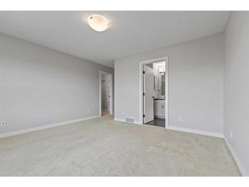 10 Nolanfield Road Nw, Calgary, AB - Indoor Photo Showing Other Room