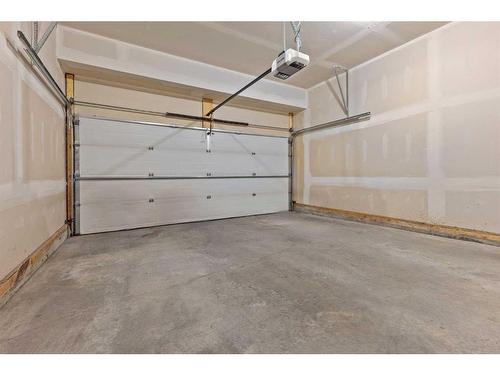 10 Nolanfield Road Nw, Calgary, AB - Indoor Photo Showing Garage