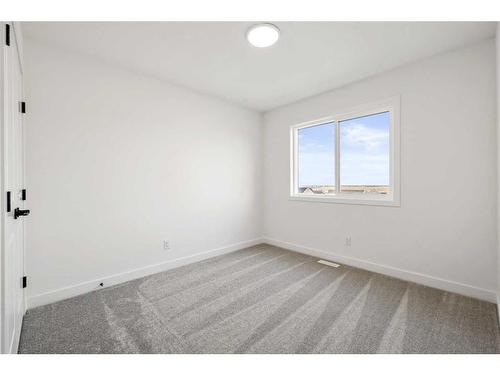 214 Marmot Walk Nw, Calgary, AB - Indoor Photo Showing Other Room