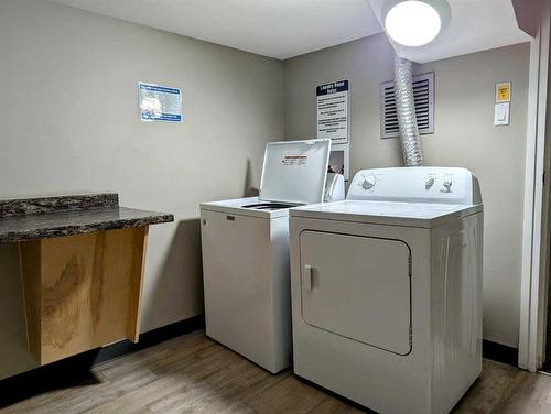 201-6108 53 Street, Olds, AB - Indoor Photo Showing Laundry Room