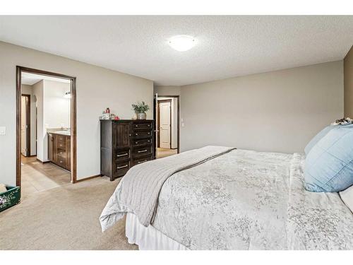 119 Chapalina Mews Se, Calgary, AB - Indoor Photo Showing Bedroom