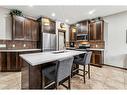 119 Chapalina Mews Se, Calgary, AB  - Indoor Photo Showing Kitchen With Double Sink With Upgraded Kitchen 