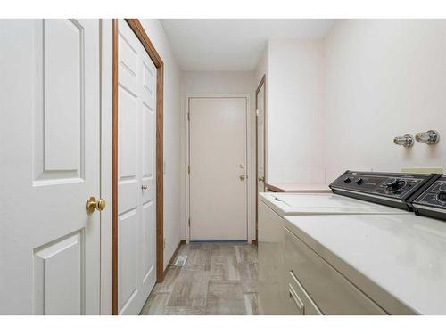 216 Sierra Morena Green Sw, Calgary, AB - Indoor Photo Showing Laundry Room