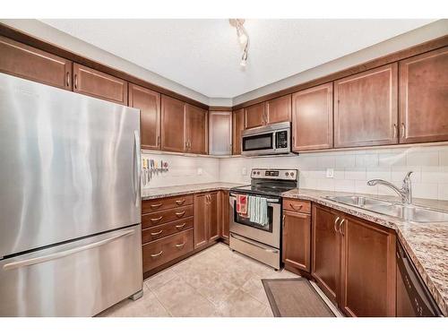 10582 Cityscape Drive Ne, Calgary, AB - Indoor Photo Showing Kitchen With Stainless Steel Kitchen With Double Sink