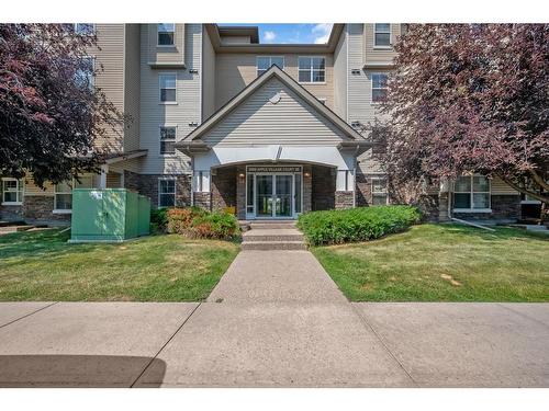 213-2000 Applevillage Court, Calgary, AB - Outdoor With Facade