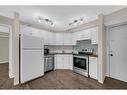 213-2000 Applevillage Court, Calgary, AB  - Indoor Photo Showing Kitchen 