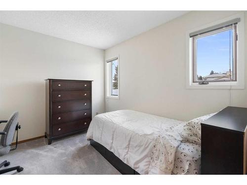 669 Hawkwood Boulevard Nw, Calgary, AB - Indoor Photo Showing Bedroom