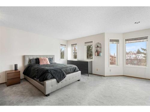 669 Hawkwood Boulevard Nw, Calgary, AB - Indoor Photo Showing Bedroom