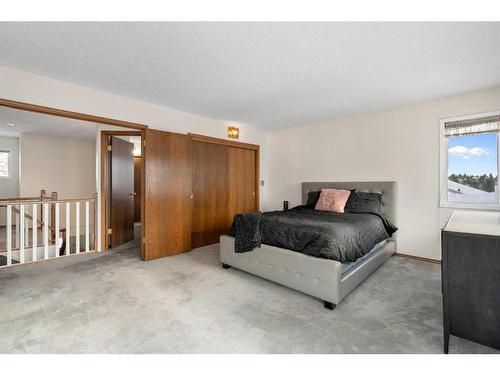 669 Hawkwood Boulevard Nw, Calgary, AB - Indoor Photo Showing Bedroom