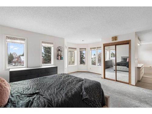 669 Hawkwood Boulevard Nw, Calgary, AB - Indoor Photo Showing Bedroom