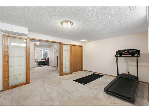 669 Hawkwood Boulevard Nw, Calgary, AB - Indoor Photo Showing Gym Room