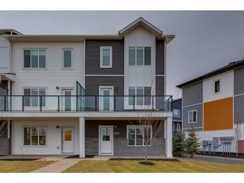 205-6 Merganser Drive West, Chestermere, AB - Outdoor With Facade