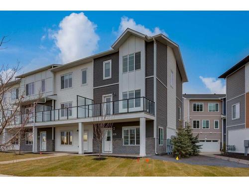 205-6 Merganser Drive West, Chestermere, AB - Outdoor With Facade