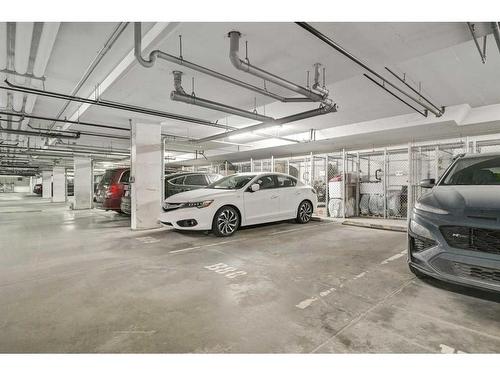 2104-215 Legacy Boulevard Se, Calgary, AB - Indoor Photo Showing Garage