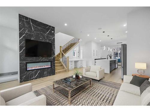 109 Hartford Road Nw, Calgary, AB - Indoor Photo Showing Living Room With Fireplace