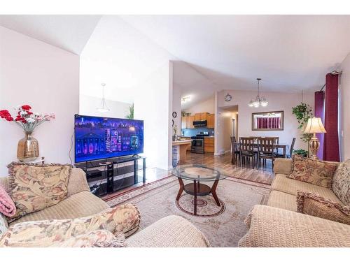 212 Taradale Drive Ne, Calgary, AB - Indoor Photo Showing Living Room