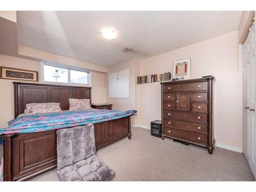 212 Taradale Drive Ne, Calgary, AB - Indoor Photo Showing Bedroom