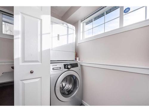 212 Taradale Drive Ne, Calgary, AB - Indoor Photo Showing Laundry Room