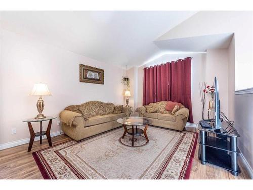 212 Taradale Drive Ne, Calgary, AB - Indoor Photo Showing Living Room