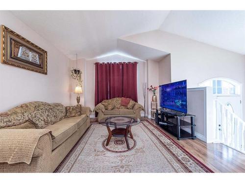 212 Taradale Drive Ne, Calgary, AB - Indoor Photo Showing Living Room