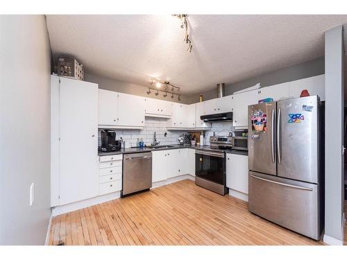 360 Abinger Crescent Ne, Calgary, AB - Indoor Photo Showing Kitchen With Stainless Steel Kitchen