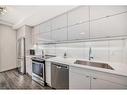 104-100 Auburn Meadows Common Se, Calgary, AB  - Indoor Photo Showing Kitchen With Stainless Steel Kitchen With Upgraded Kitchen 