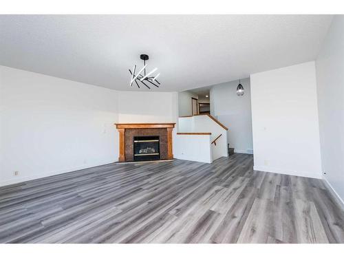 12739 Coventry Hills Way Ne, Calgary, AB - Indoor Photo Showing Living Room With Fireplace