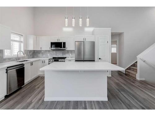 55 Willowbrook Crescent Nw, Airdrie, AB - Indoor Photo Showing Kitchen With Stainless Steel Kitchen With Upgraded Kitchen