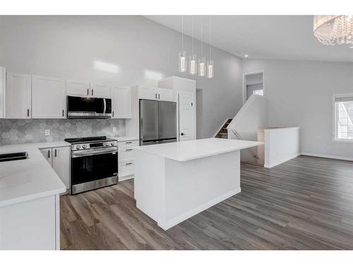 55 Willowbrook Crescent Nw, Airdrie, AB - Indoor Photo Showing Kitchen With Stainless Steel Kitchen With Upgraded Kitchen