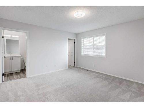 55 Willowbrook Crescent Nw, Airdrie, AB - Indoor Photo Showing Other Room