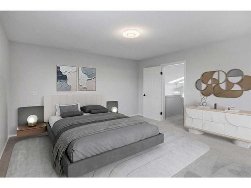 55 Willowbrook Crescent Nw, Airdrie, AB - Indoor Photo Showing Bedroom