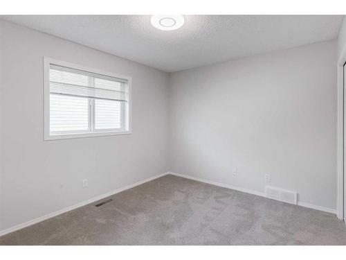 55 Willowbrook Crescent Nw, Airdrie, AB - Indoor Photo Showing Other Room