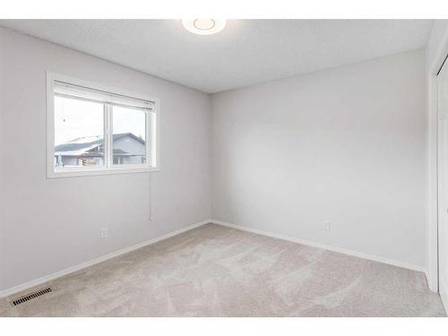 55 Willowbrook Crescent Nw, Airdrie, AB - Indoor Photo Showing Other Room