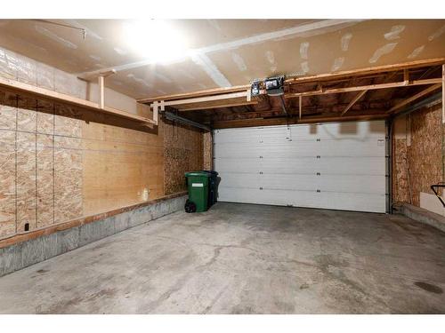 55 Willowbrook Crescent Nw, Airdrie, AB - Indoor Photo Showing Garage