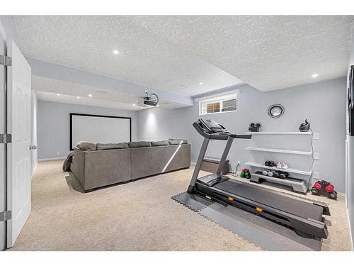 36 Brightonstone Gardens Se, Calgary, AB - Indoor Photo Showing Gym Room