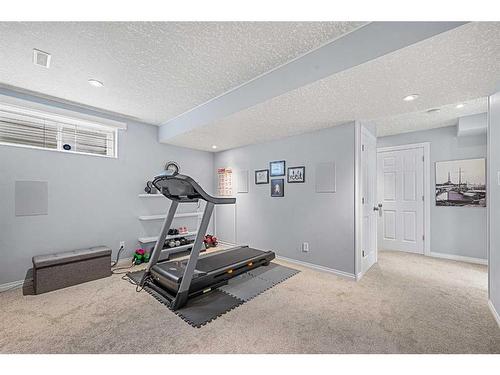 36 Brightonstone Gardens Se, Calgary, AB - Indoor Photo Showing Gym Room