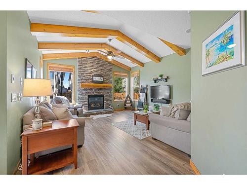 36 Brightonstone Gardens Se, Calgary, AB - Indoor Photo Showing Living Room With Fireplace