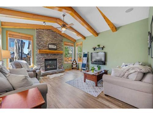 36 Brightonstone Gardens Se, Calgary, AB - Indoor Photo Showing Living Room With Fireplace