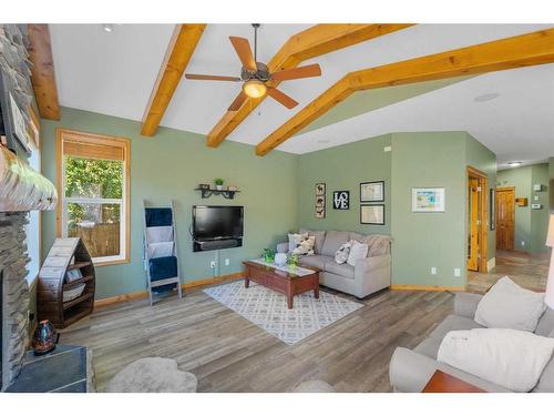 36 Brightonstone Gardens Se, Calgary, AB - Indoor Photo Showing Living Room With Fireplace