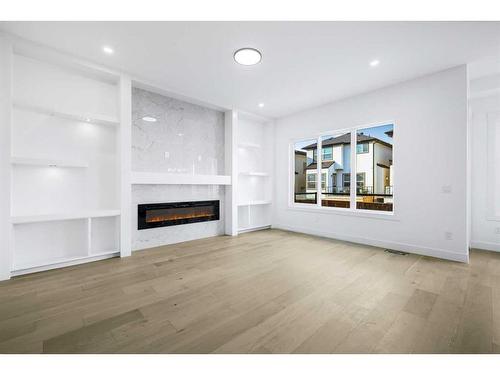 4516 87Avenue Ne Avenue Ne, Calgary, AB - Indoor Photo Showing Living Room With Fireplace