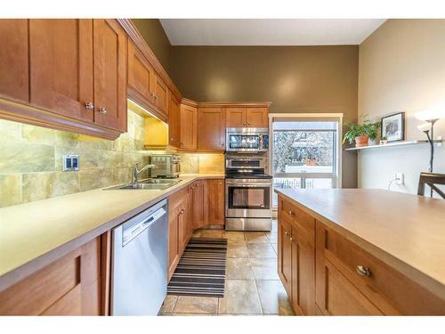 58 Brae Glen Lane Sw, Calgary, AB - Indoor Photo Showing Kitchen With Double Sink