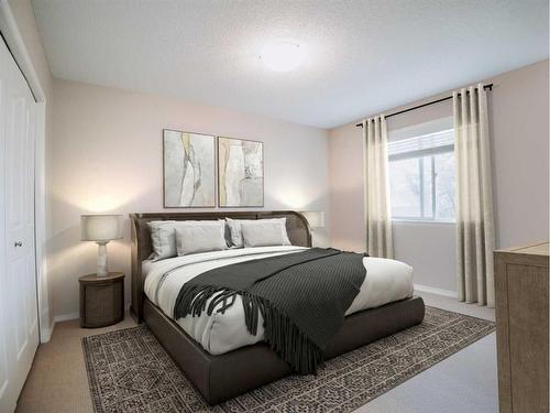 207 Cranberry Way Se, Calgary, AB - Indoor Photo Showing Bedroom