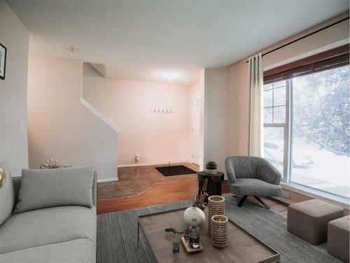 207 Cranberry Way Se, Calgary, AB - Indoor Photo Showing Living Room