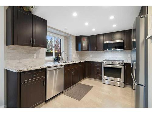 77 Shannon Circle Sw, Calgary, AB - Indoor Photo Showing Kitchen With Stainless Steel Kitchen With Upgraded Kitchen